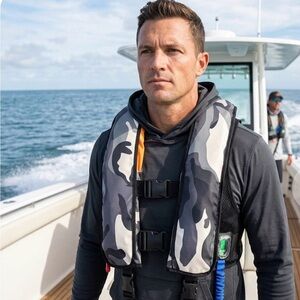 Water sports emergency self inflatable vest